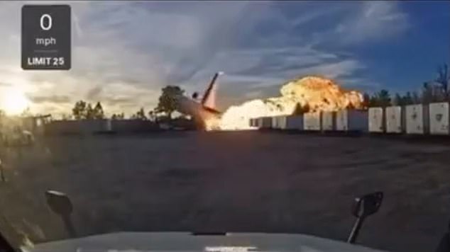 Dash cam footage taken by a local driver showed the moment the plane cut across one of the businesses