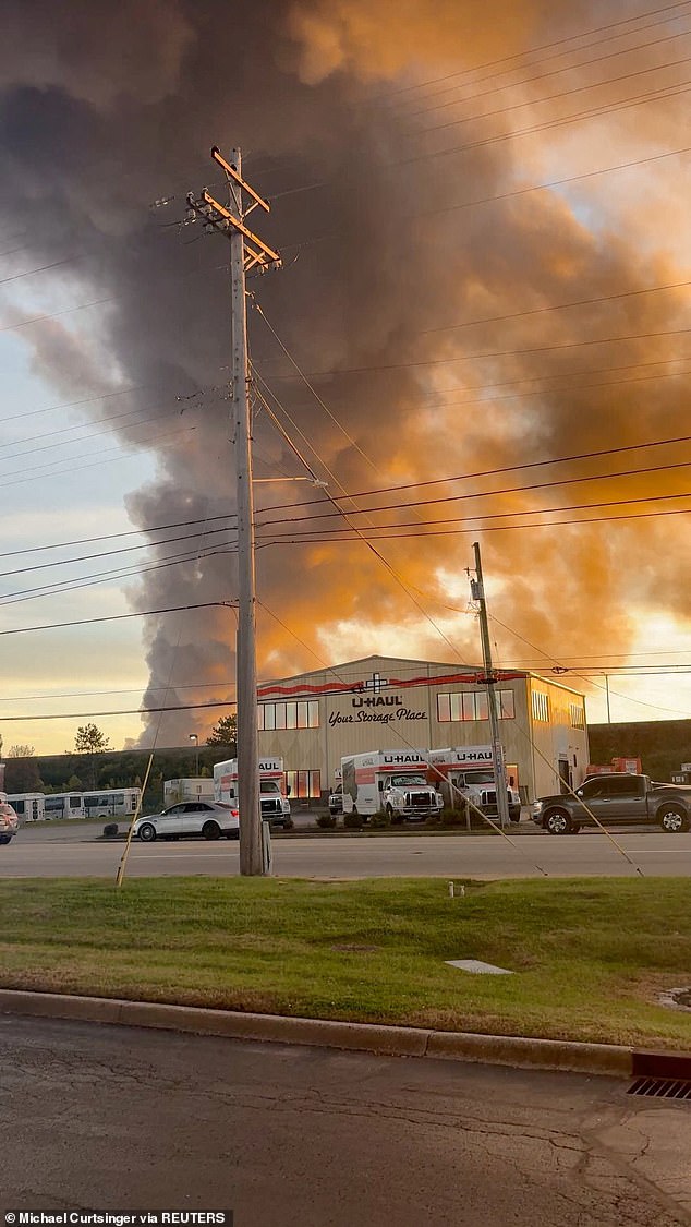 Smoke rises after a UPS plane crashed in Louisville, Kentucky, U.S. November 4, 2025, in this screen grab obtained from a social media video