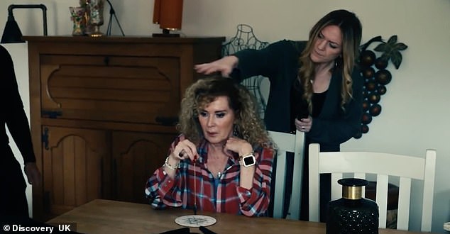 Stepping in to help her, one of the experts asked: 'Are you alright? Are you OK?' as they rushed to 'clear the aura and energy' from around her and assist her