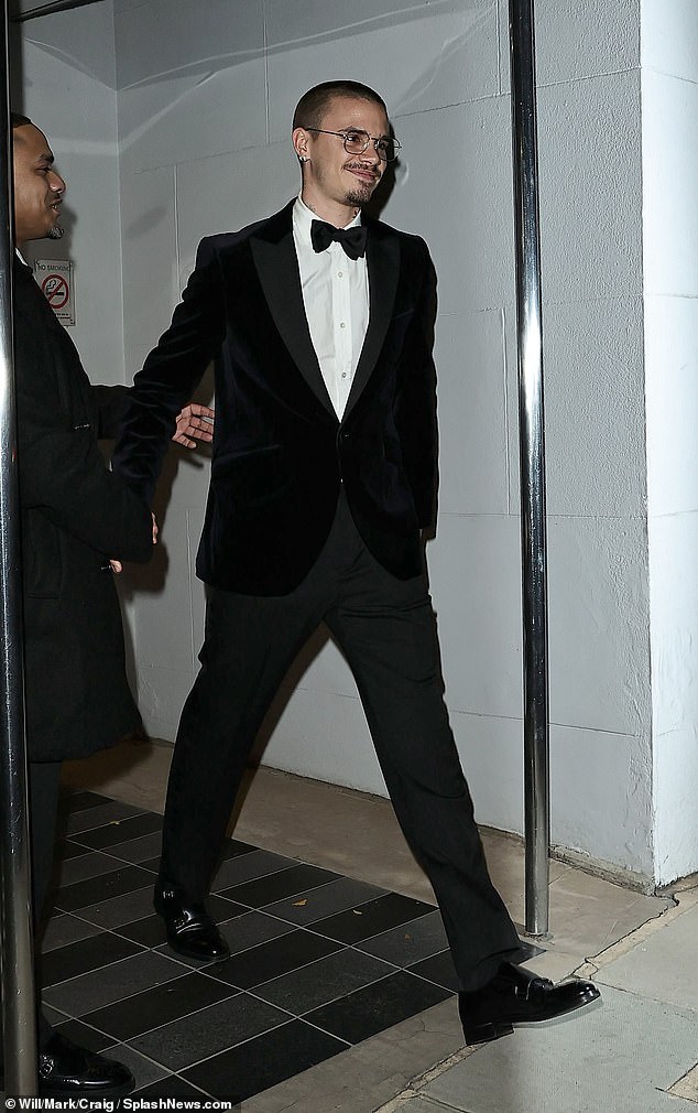 A source close to the family revealed to the Daily Mail that family friend Gordon was delighted to host the dinner party as his gift to his best pal; pictured Romeo Beckham