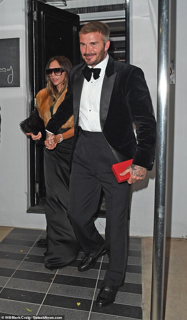 David's close friend Gordon Ramsay threw a huge party at his Chelsea restaurant, where the star celebrated into the early hours with his nearest and dearest. Pictured: David steps out with Victoria