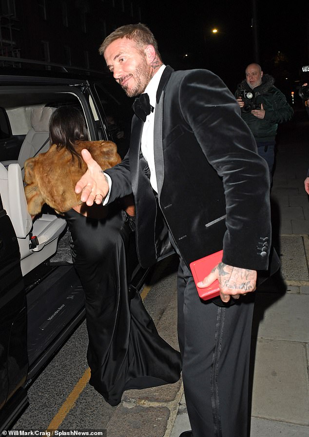 David meanwhile looked the part in a classic velvet tux, having earlier worn a bespoke suit created by his designer wife for the royal ceremony