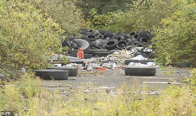 In the middle of a vast concrete foundation, the Pinkmas site was flooded, the floor covered in manholes and littered with of old tyres