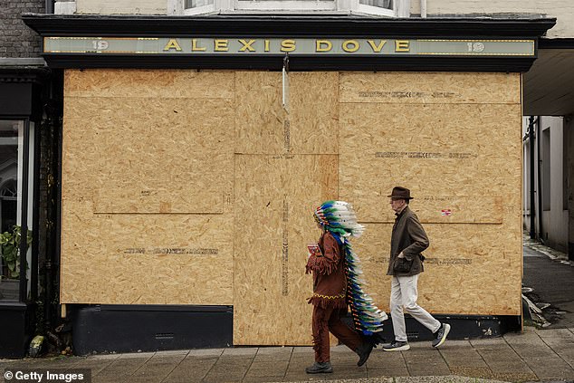 Earlier, local businesses in Lewes had prepared for the annual bonanza by boarding up their shopfronts