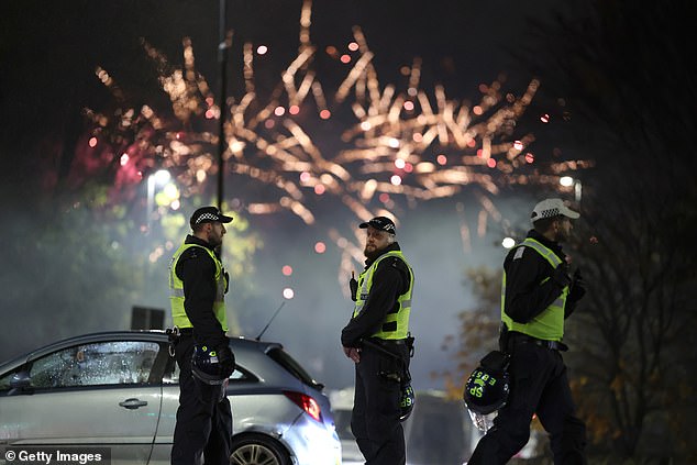 Police officers patrol the streets in Edinburgh, Scotland. Firework Control Zones have been put in place in nine areas across Scotland's capital