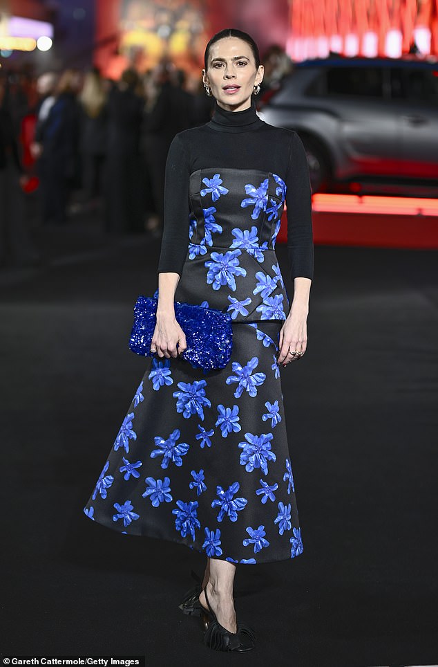 The actress, 23, posed up a storm as she joined Hayley Atwell (pictured) and her co-star Glen Powell on the red carpet