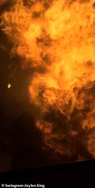 A ball of flames grew in the distance