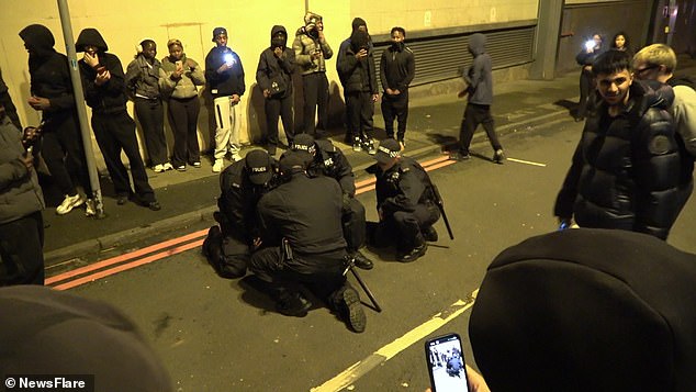 Four teenage boys were arrested on suspicion of violent disorder following the shocking incident that took place less than 200 metres from Birmingham Children's Hospital