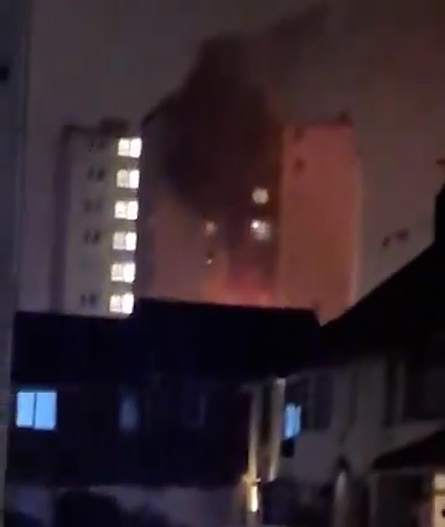 Pictured: Knowsley Heights tower block where a fire broke out on the third floor