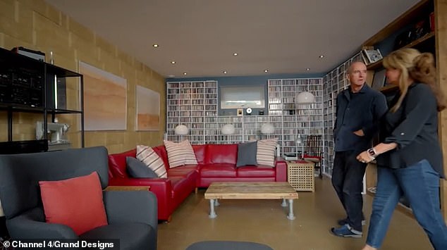 They'd also transformed the living room and replaced the decorations with a wall of CDs