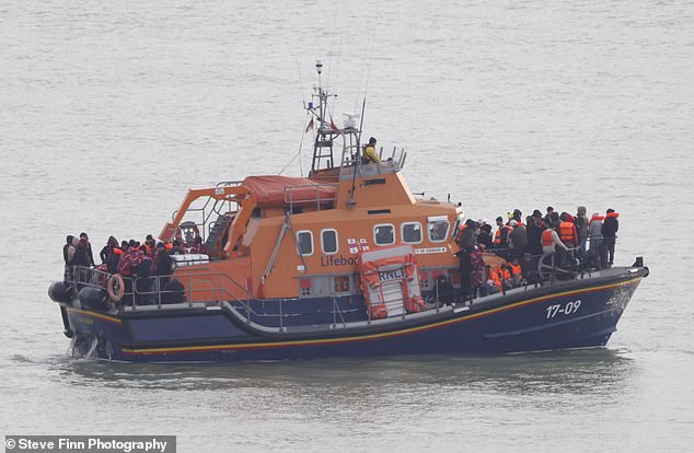 An RNLI lifeboat was also involved in picking up migrants from the Channel and bringing them into the Port of Dover