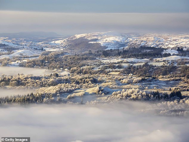 Pictured: Looking towards Hawkshead from Wansfell in the Lake District