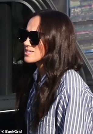 Meghan waved and smiled to production staff before she was swept to a large estate in the hills of Pasadena