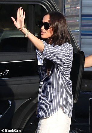 Meghan waved and smiled to production staff before she was swept to a large estate in the hills of Pasadena