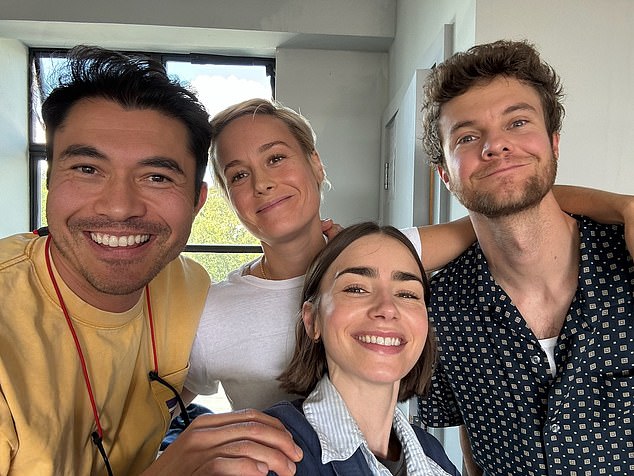 Meghan is starring in the film alongside Henry Golding, Brie Larson, Lily Collins and Jack Quaid (left to right)