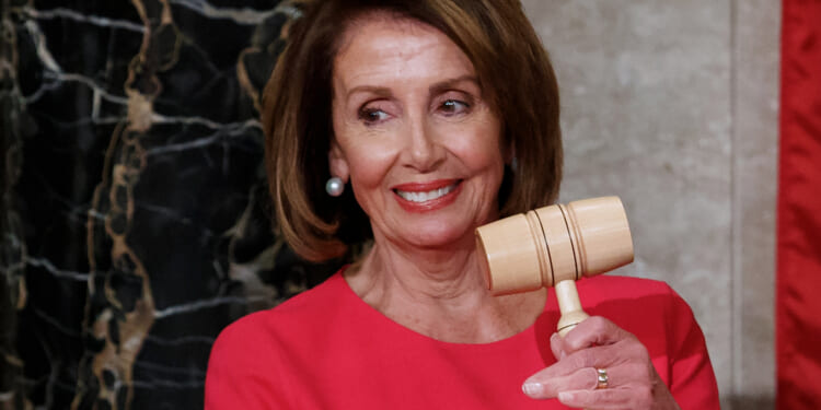 Then-House Speaker Nancy Pelosi of California holds the gavel at the Capitol in Washington, D.C., on Jan. 3, 2019.