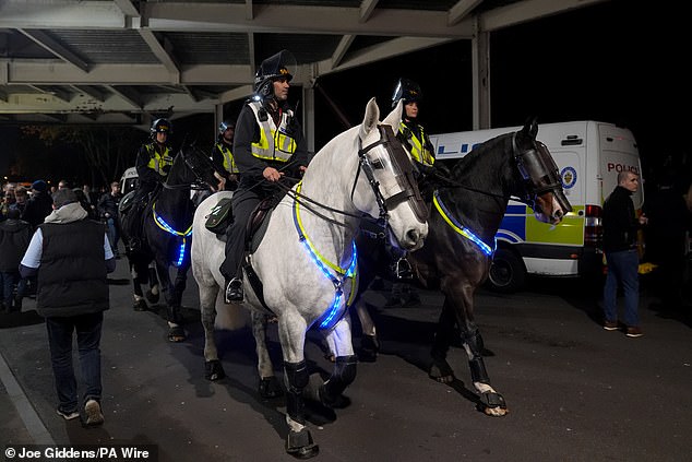 Police ride in on horses as fears over potential violence ahead of the Aston Villa fixture led hundreds of officers to the scene
