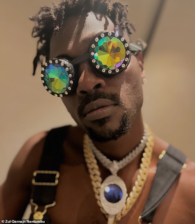 Brown is purportedly seen wearing the pendant he's accused of stealing from Nantambu