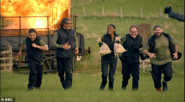 Sprinting towards her in slow-motion, the train exploded behind them in a huge fireball, causing both the celebrities and viewers to react in shock