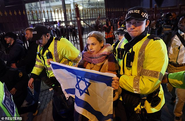Our Fight protesters carried Israeli flags and placards arguing, among other things, that their opponents were 'extremists' motivated by anti-Semitism
