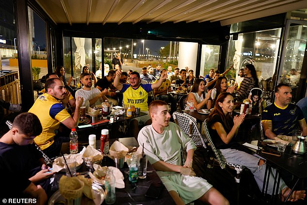 Israeli fans pictured watching the action in Holon, Israel