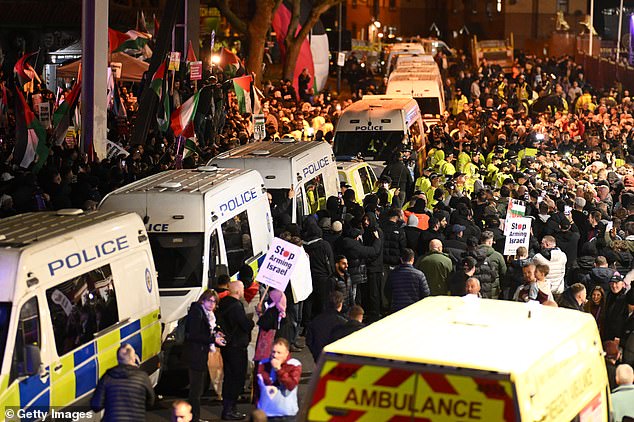 Separating the warring tribes were 700 nervous-looking police officers, including many in riot gear