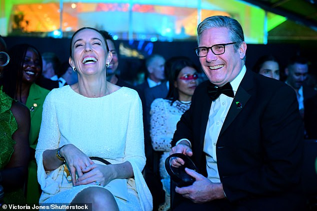 Jacinda Ardern and Prime Minister Sir Keir Starmer laugh as they attend The Earthshot Prize Awards Ceremony