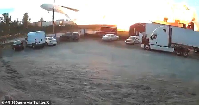 UPS Flight 2976 erupted into a fireball as it crashed through industrial buildings outside of Louisville's Muhammad Ali International Airport and engulfed the area in flames shortly after 5pm on Tuesday