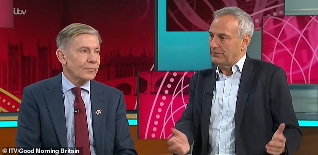 Kevin Maguire (right) opted not to wear a poppy as he joined the Daily Mail's Andrew Pierce (left), Susanna Reid and Ed Balls to discuss the latest news on GMB