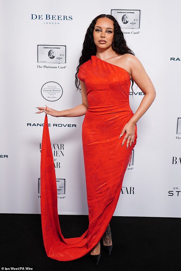 The singer opted for a quirky eye shadow look to complement her bold gown