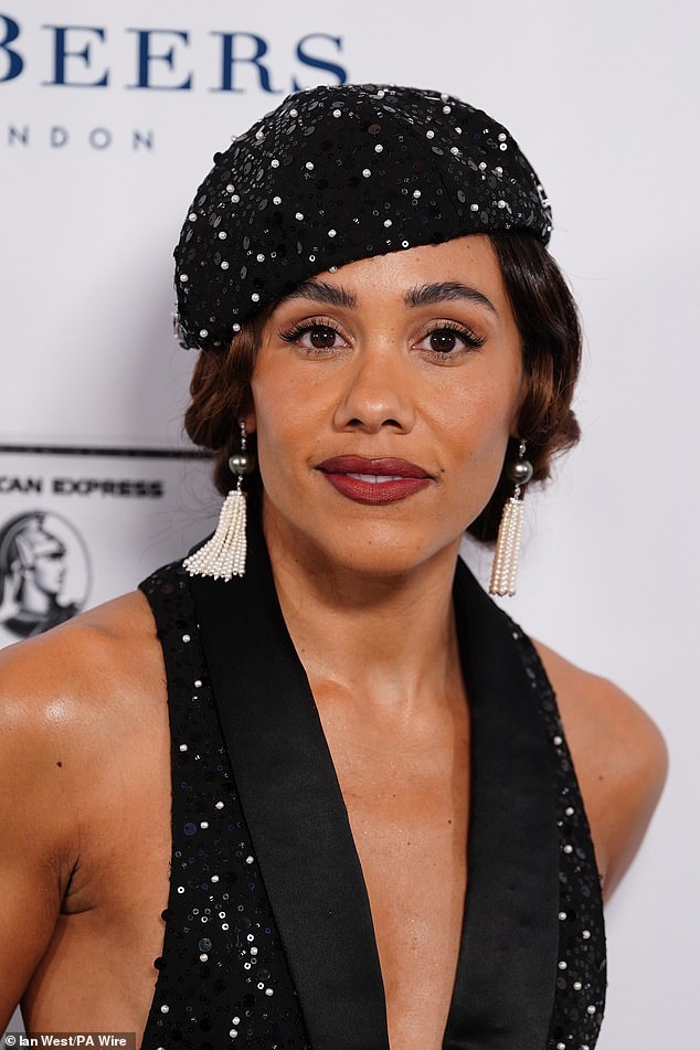 She complemented her look with a red lip