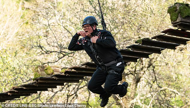 The celebrities had to cross the rickety bridge unaided in order to bag the prize money, and the comedian couldn't stop screaming as he tentatively made his way across