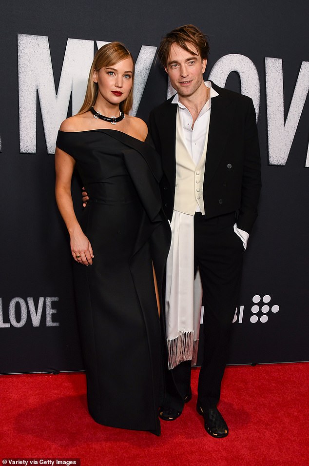 The Oscar-winner, 35, recently opened up about feeling completely comfortable shooting explicit scenes with Robert Pattinson in their new film Die My Love, 39; pictured this month