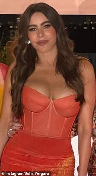 Sofia had on a red dress with a sweetheart neckline