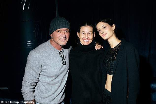 He kept it casual wearing a long-sleeved, gray sweater as well as a pair of classic denim jeans and a dark gray knit beanie on top of his head