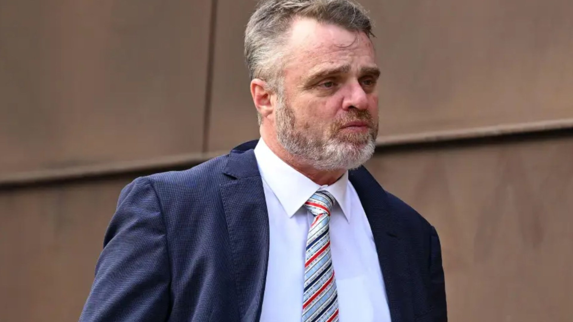 Ex-Neighbours star Damien Richardson found guilty of performing Nazi salute on stage