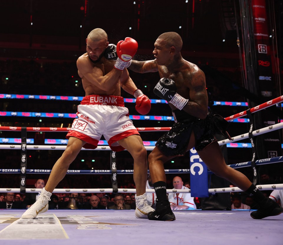 Chris Eubank Jr. in white shorts fighting Conor Benn in a middleweight boxing contest.