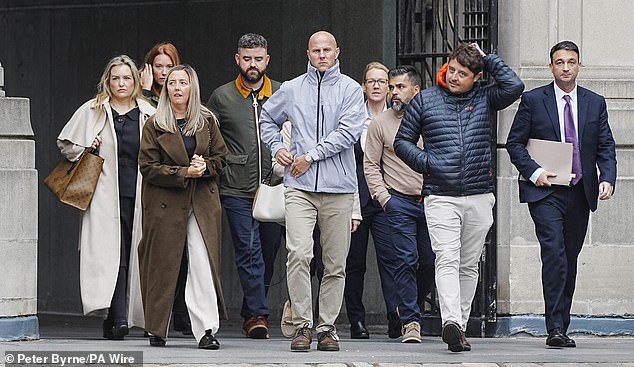 Families of the victims with their legal team arrive at Liverpool Town Hall for the Southport Inquiry