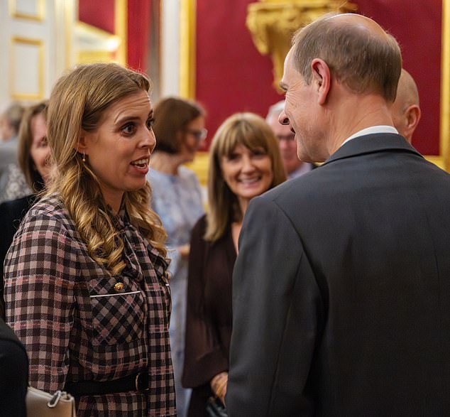 Princess Beatrice pictured accepting her role as deputy patron of The Outward Bound Trust with her uncle Prince Edward at a reception and dinner at St James's Palace on Thursday