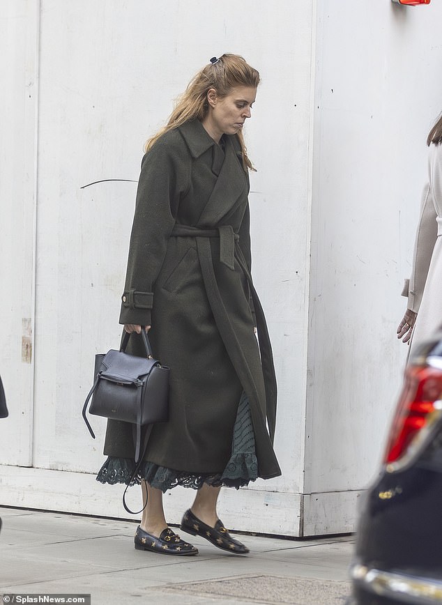 Beatrice then looked downcast as she walked off in central London without Eugenie