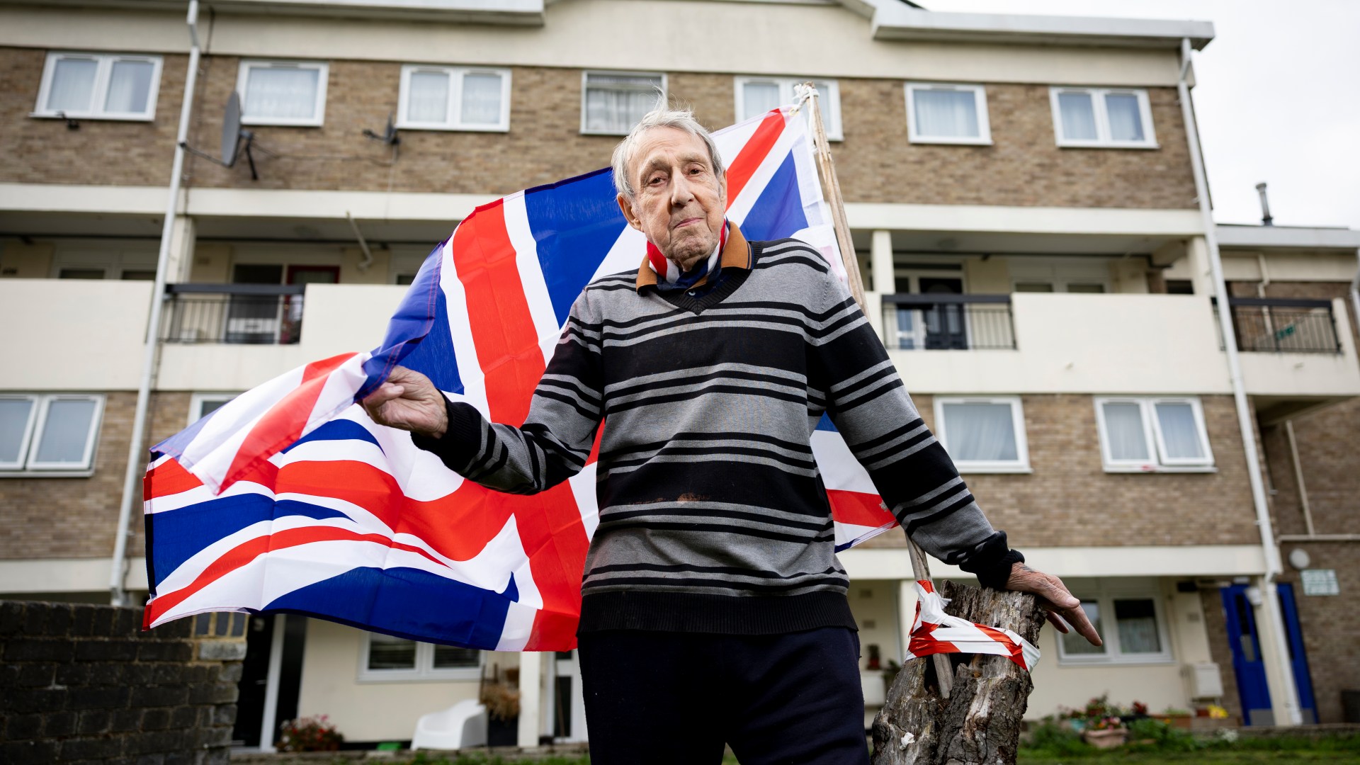 Great grandad, 86, proudly flying his 50-year old British flag again after sneaky council REMOVED it