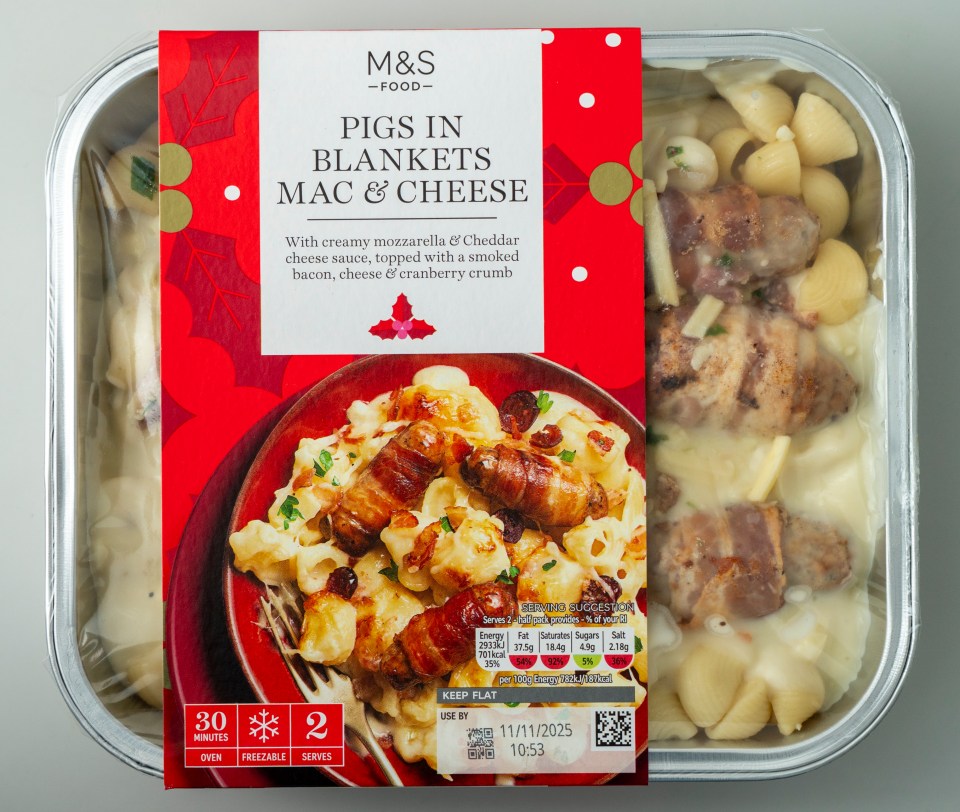 M&S Pigs in Blankets Mac & Cheese meal in a foil container.