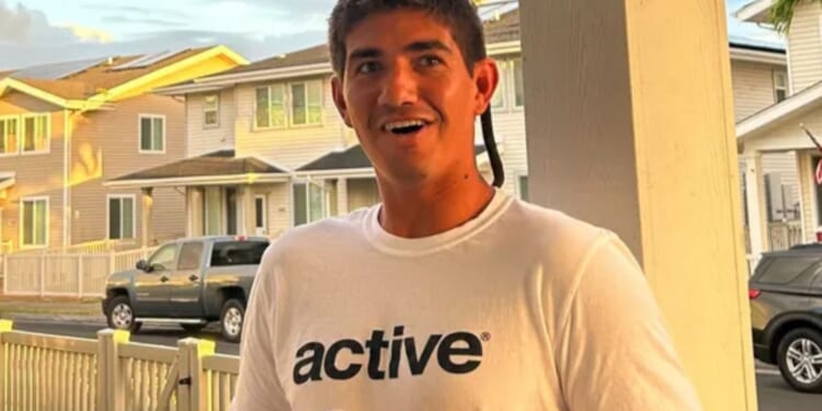 Shark savagely mauls lifeguard leaving him consciousness as terrified beachgoers see 'big red stain' in the water