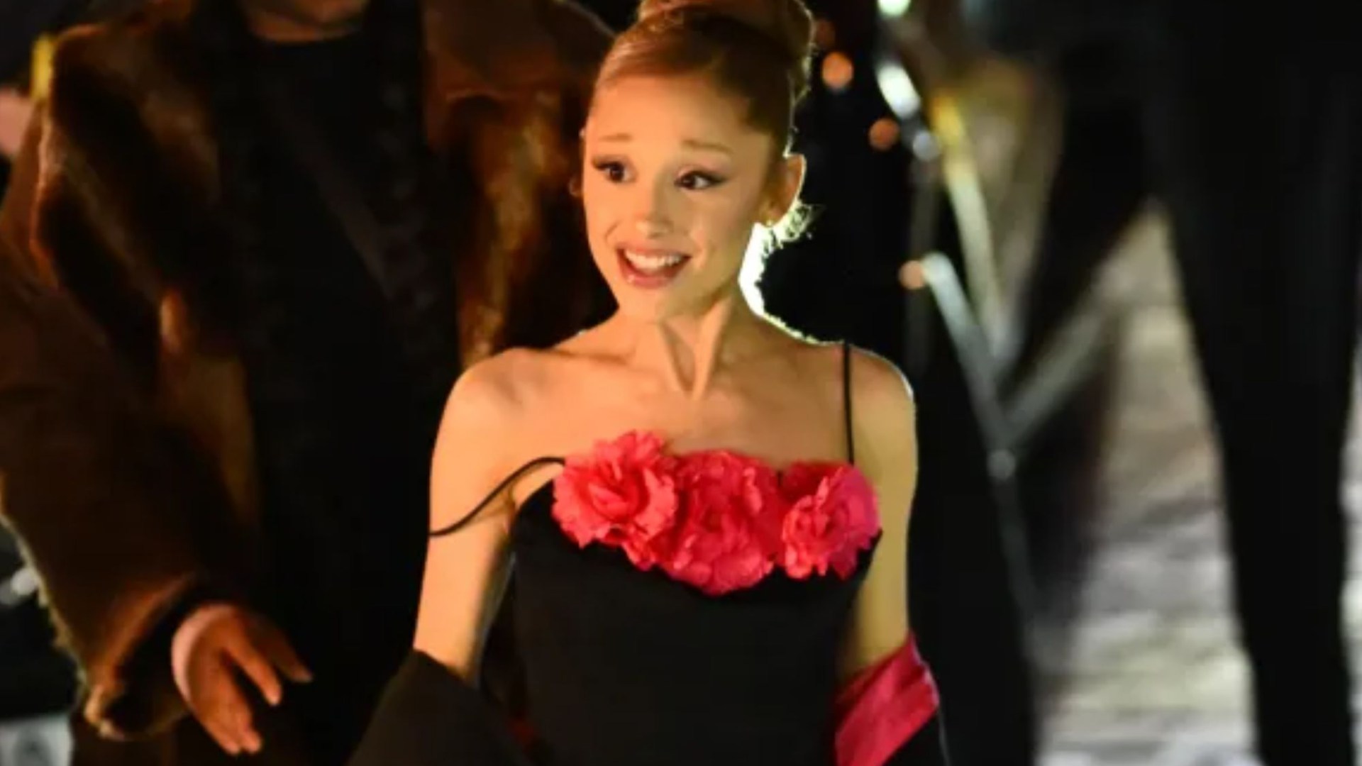 Ariana Grande stuns in floral dress as she enjoys night out with co-stars in Paris ahead of Wicked sequel release