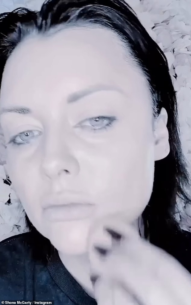 Alongside a black and white clip applying make-up, she penned a lengthy caption with lyrics from her new song about 'finally being herself' as she marked a 'new beginning'