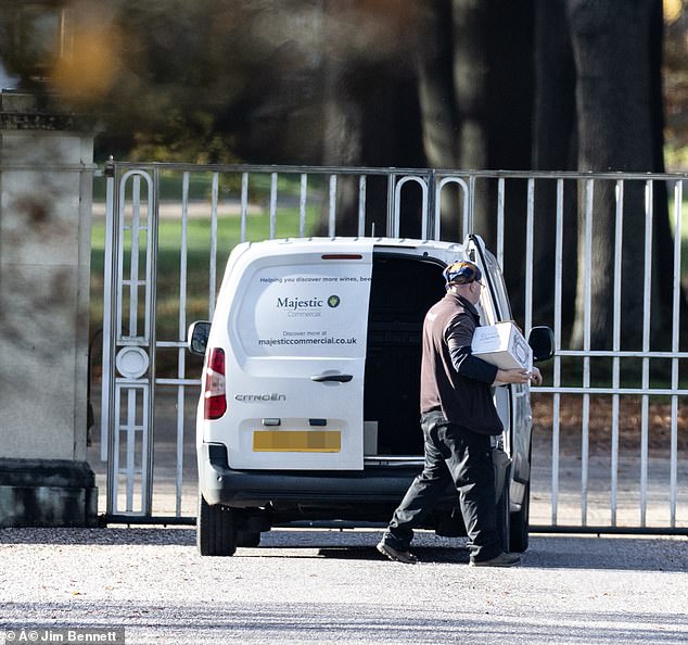 A man was spotted carrying one of the boxes inside the estate, where Andrew and his wife are currently holed up