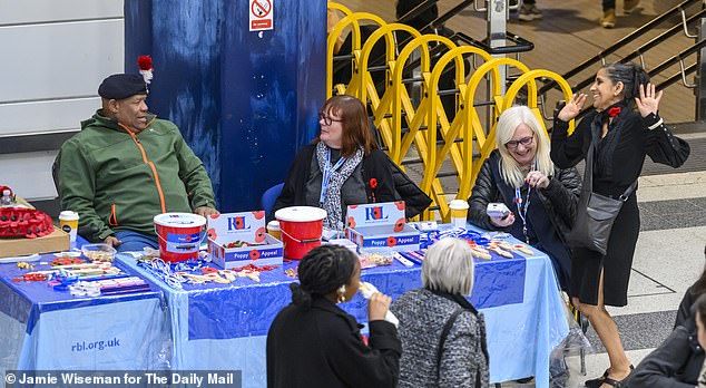 Poppy sellers from the Royal British Legion had a stand at Liverpool Street Station but few people passing buy bought one