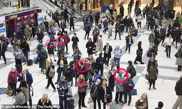Only four people from a crowd of nearly 100 people were spotted wearing poppies at Liverpool Street Station