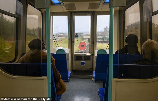 The DLR tube line was adorned with poppies at its front and back, unlike any of its passengers