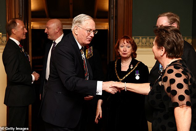 Prince Richard, the late Queen Elizabeth II's cousin, shakes hands upon his arrival at the Royal Albert Hall